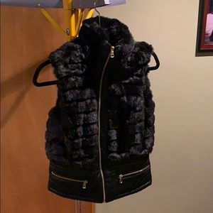 Classy faux fur and leather vest